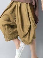 Vintage Irregular Pocket Elastic Waist Pure Color Pants For Women